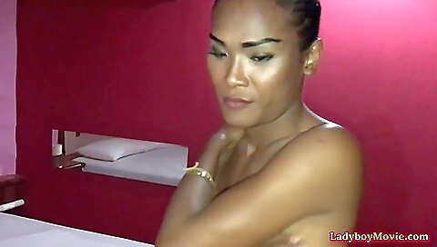 An Asian chick gives an enthusiastic blowjob on camera